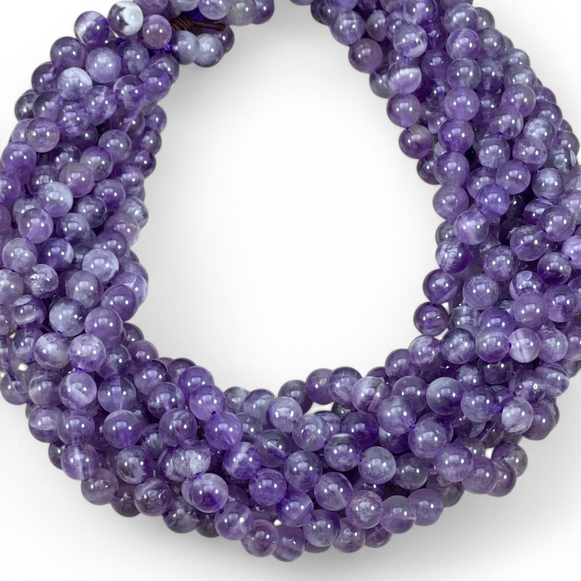 Dog Tooth Amethyst Round - Rubber City Bargains